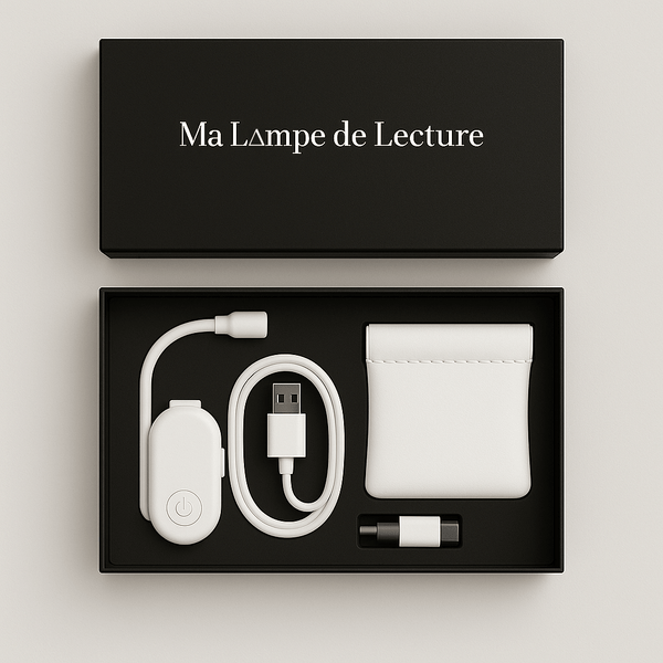 Coffret lampe de lecture noir avec lampe, câble USB et pochette de transport.